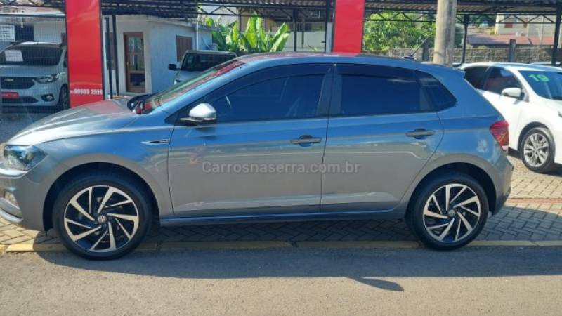 VOLKSWAGEN - POLO - 2022/2022 - Cinza - R$ 93.900,00
